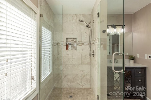 full bathroom featuring plenty of natural light and a tile shower