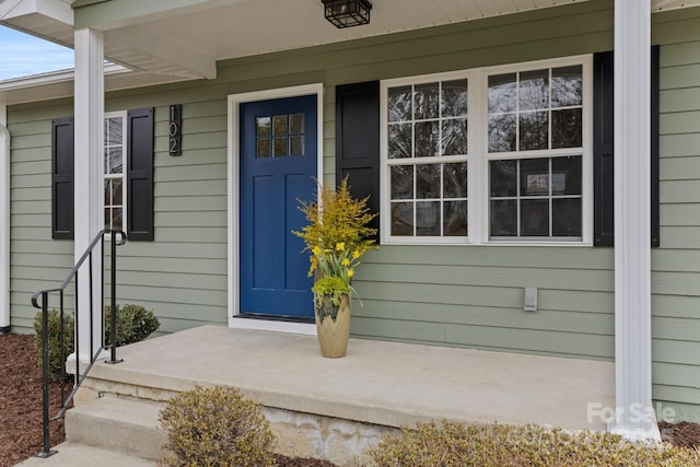 entrance to property with covered porch