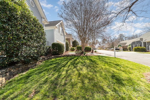 view of yard with a residential view