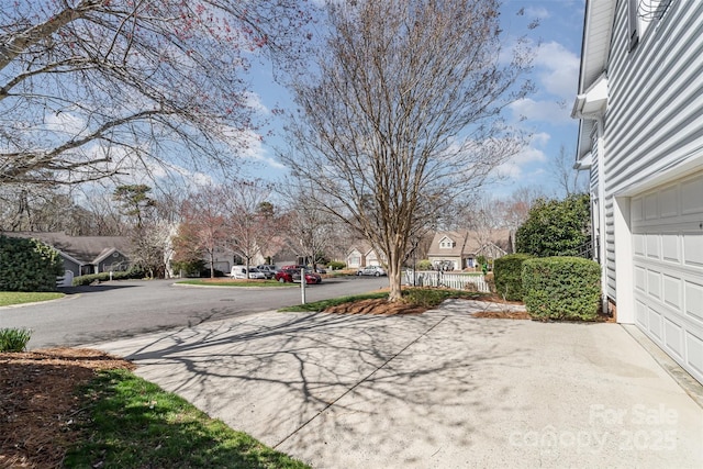 view of road with a residential view