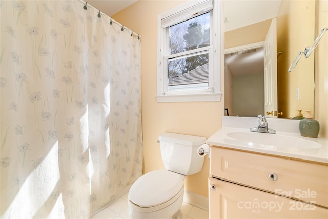 bathroom featuring toilet, tile patterned flooring, a shower with shower curtain, and vanity