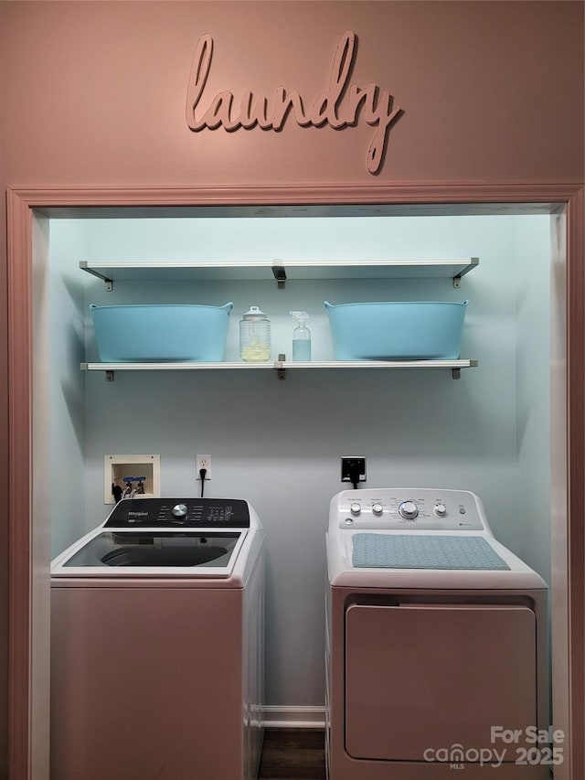 laundry room with laundry area and washer and clothes dryer