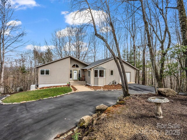 209 Walnut Ridge Rd, Brevard, NC 28712 - view of side of property featuring a garage and driveway