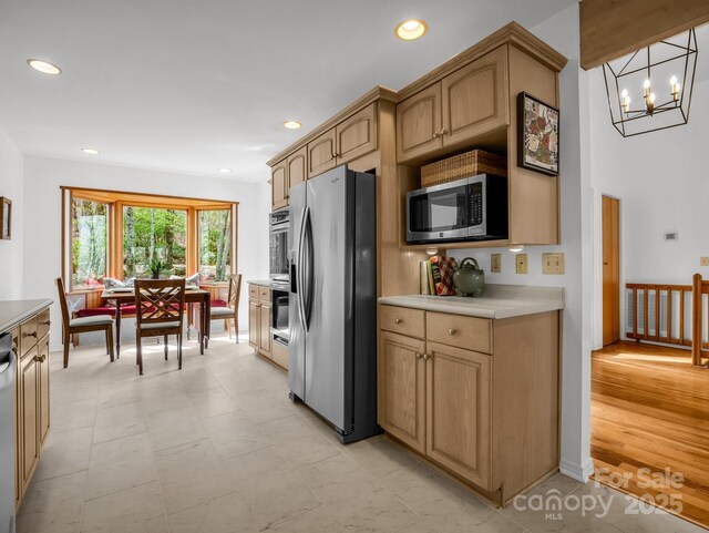 209 Walnut Ridge Rd, Brevard, NC 28712 - kitchen featuring appliances with stainless steel finishes, an inviting chandelier, light countertops, and recessed lighting