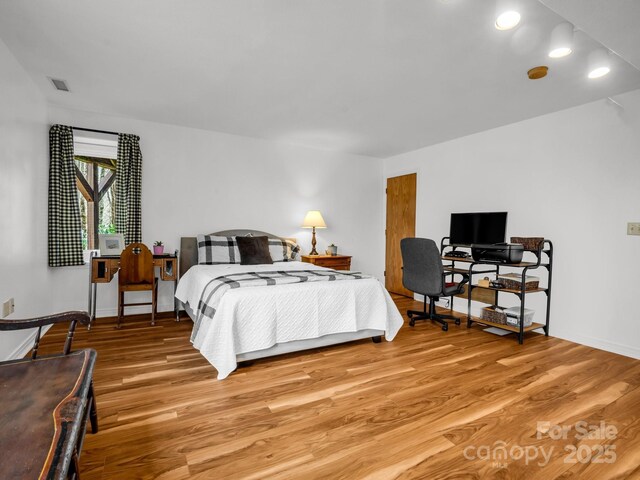 209 Walnut Ridge Rd, Brevard, NC 28712 - bedroom featuring light wood-style floors, baseboards, and visible vents