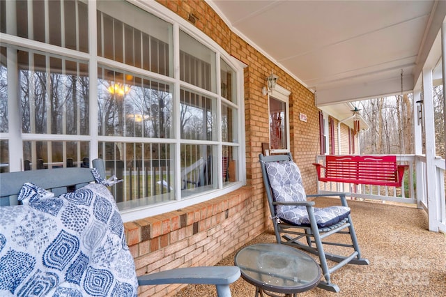 view of patio featuring covered porch