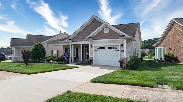 313 Garner Dr, Salisbury, NC 28146 - craftsman-style house featuring covered porch, stone siding, a front yard, an attached garage, and driveway