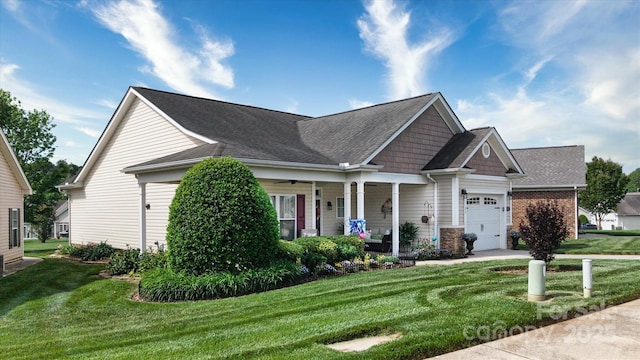 313 Garner Dr, Salisbury, NC 28146 - craftsman inspired home featuring an attached garage, a shingled roof, a front lawn, and a porch