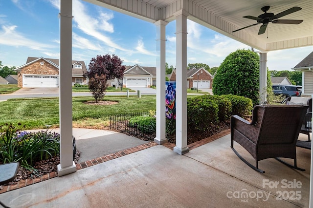 313 Garner Dr, Salisbury, NC 28146 - view of patio featuring ceiling fan and a residential view
