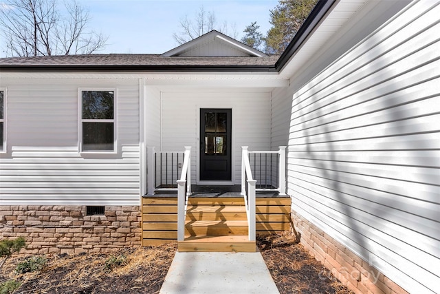 view of exterior entry featuring crawl space