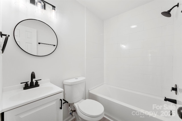 full bathroom featuring toilet, washtub / shower combination, and vanity