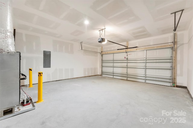 garage with electric panel and a garage door opener