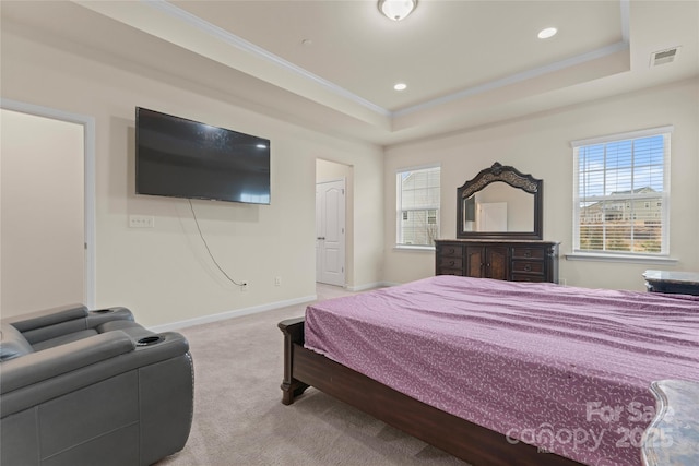 carpeted bedroom featuring visible vents, baseboards, recessed lighting, crown molding, and a raised ceiling