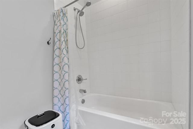 full bathroom featuring shower / bath combo with shower curtain