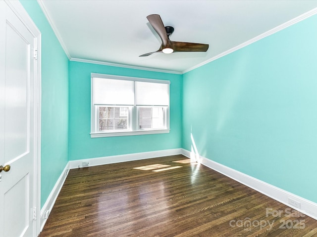 unfurnished room with a ceiling fan, baseboards, dark wood-type flooring, and crown molding