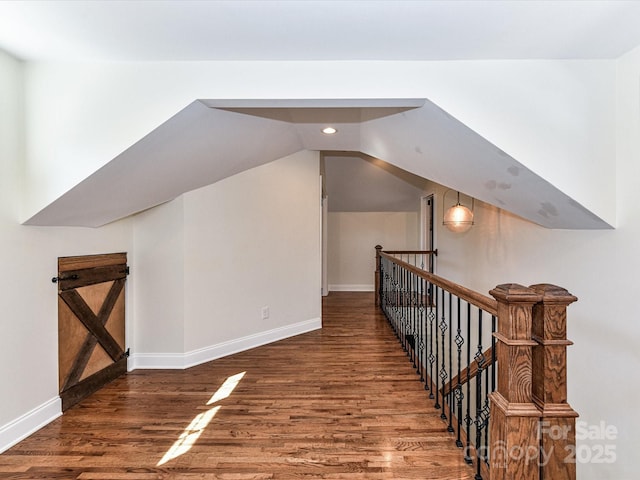 bonus room featuring vaulted ceiling, recessed lighting, baseboards, and wood finished floors