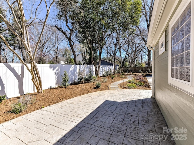 view of patio with a fenced backyard