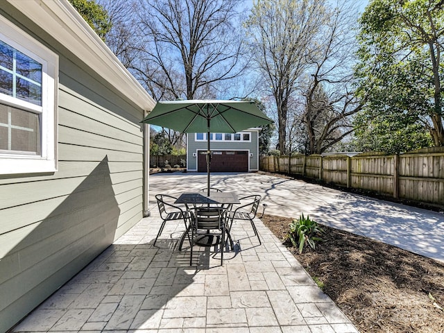 view of patio / terrace with outdoor dining area and fence private yard