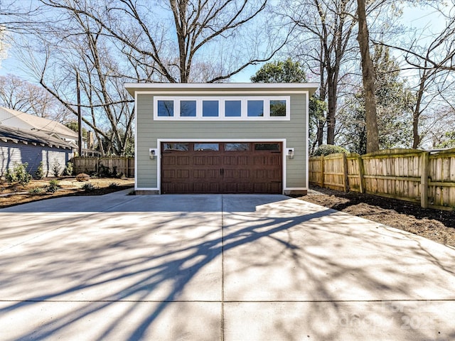 garage with fence