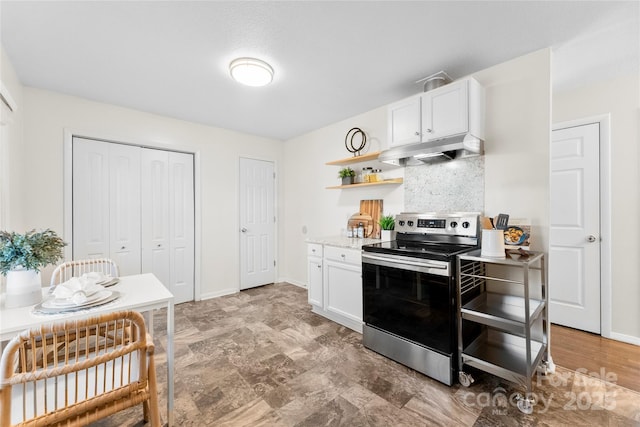 kitchen with open shelves, light countertops, electric stove, under cabinet range hood, and white cabinetry