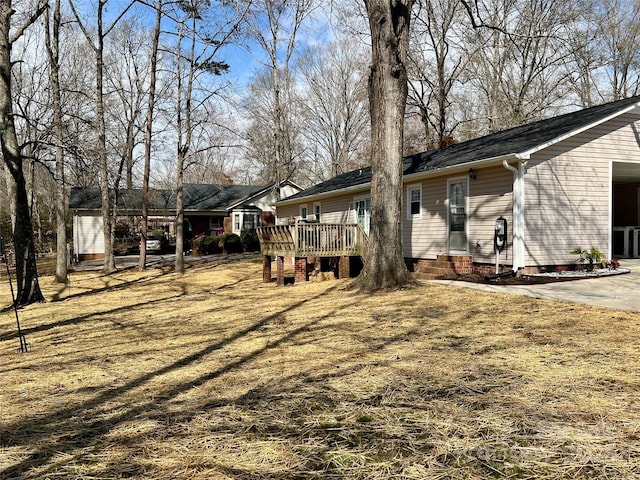 exterior space featuring entry steps and a deck