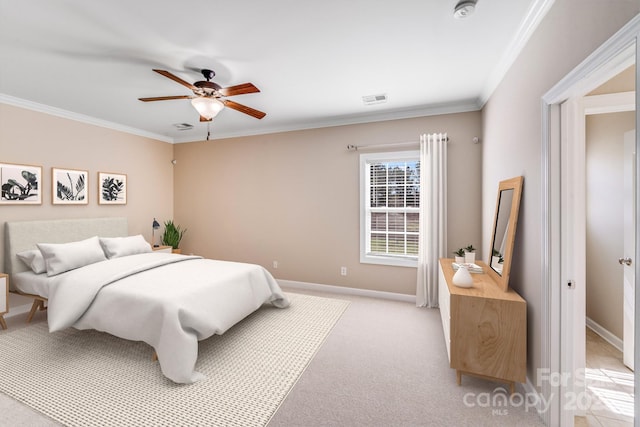 bedroom with visible vents, baseboards, light colored carpet, ceiling fan, and ornamental molding