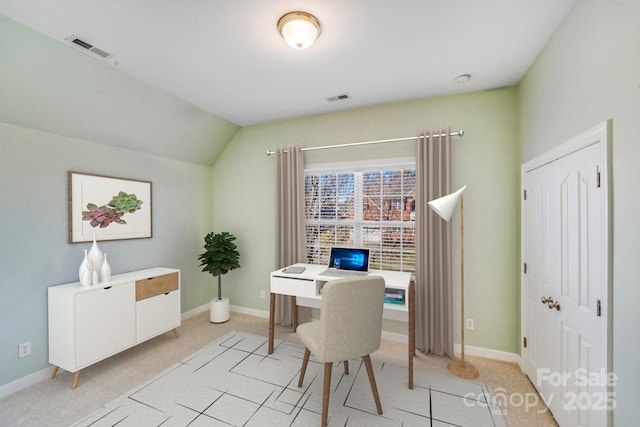 home office with baseboards, visible vents, and vaulted ceiling