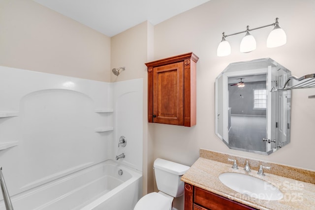 full bath featuring toilet, ceiling fan, vanity, and shower / bathing tub combination