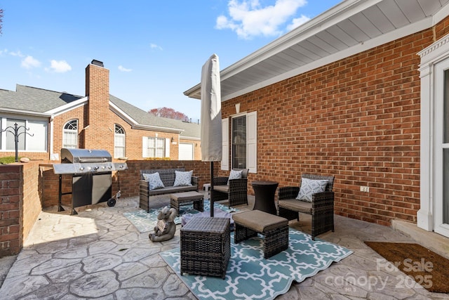 view of patio / terrace featuring outdoor lounge area and a grill