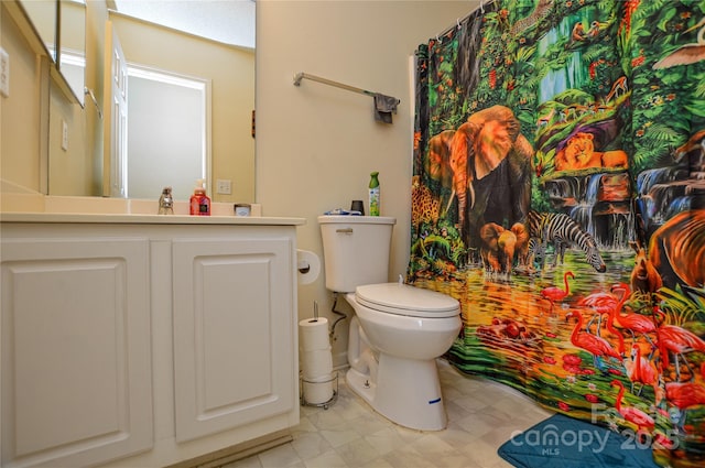 full bathroom featuring toilet and vanity