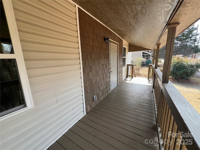 deck featuring covered porch