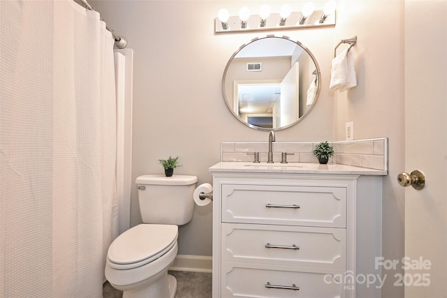 full bathroom with baseboards, visible vents, vanity, and toilet