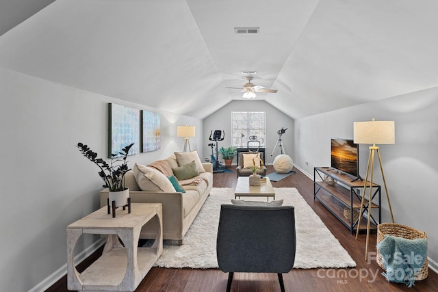 living area with visible vents, baseboards, ceiling fan, dark wood-style flooring, and vaulted ceiling