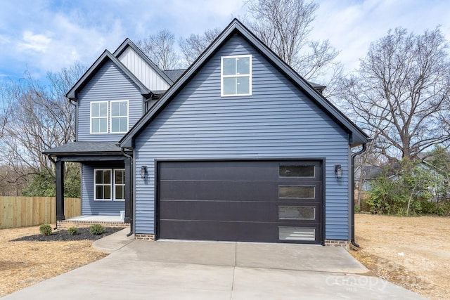 view of front of property with a shingled roof, board and batten siding, fence, a garage, and driveway