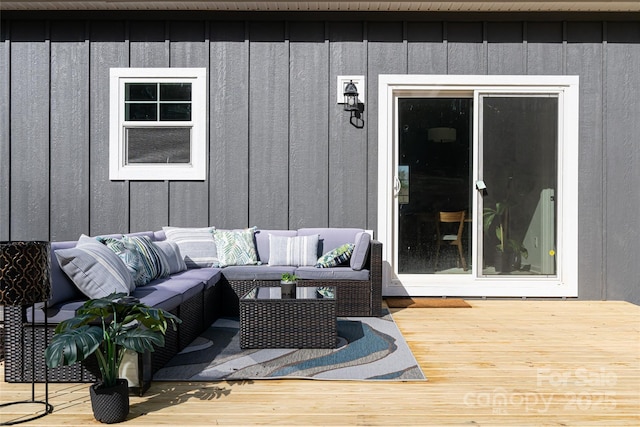 wooden deck featuring outdoor lounge area