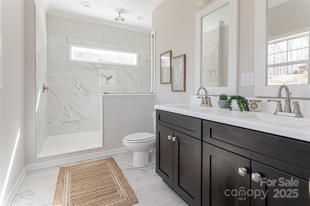 full bathroom featuring marble finish floor, a sink, and toilet