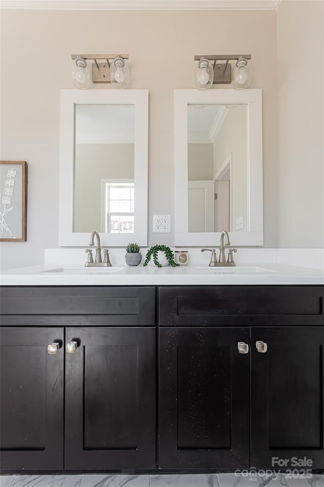 bathroom with double vanity, ornamental molding, and a sink