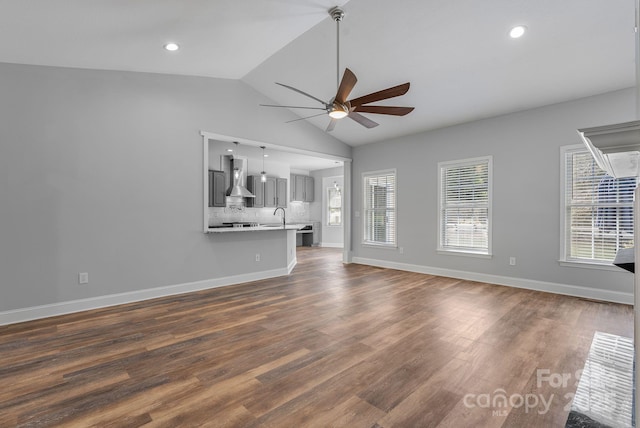 79 Mill Pond Way, Hendersonville, NC 28791 - unfurnished living room with dark wood-type flooring, plenty of natural light, ceiling fan, and a sink