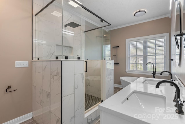 79 Mill Pond Way, Hendersonville, NC 28791 - bathroom featuring a marble finish shower, baseboards, ornamental molding, and a sink