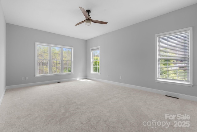 79 Mill Pond Way, Hendersonville, NC 28791 - unfurnished room with visible vents, baseboards, a wealth of natural light, and ceiling fan