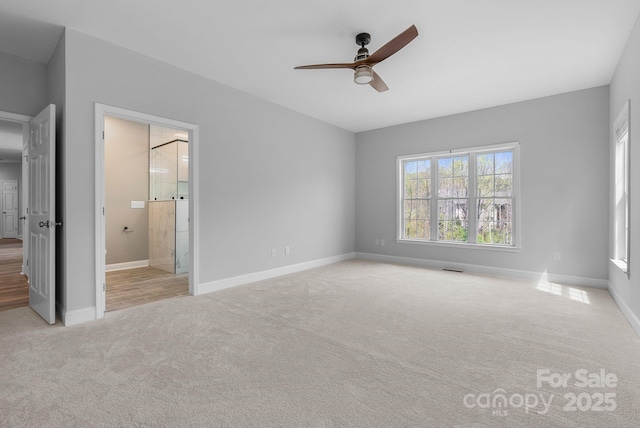 79 Mill Pond Way, Hendersonville, NC 28791 - unfurnished bedroom featuring ensuite bath, ceiling fan, baseboards, and carpet flooring