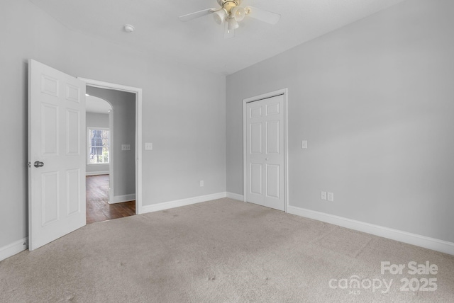 79 Mill Pond Way, Hendersonville, NC 28791 - interior space featuring a ceiling fan, baseboards, and arched walkways
