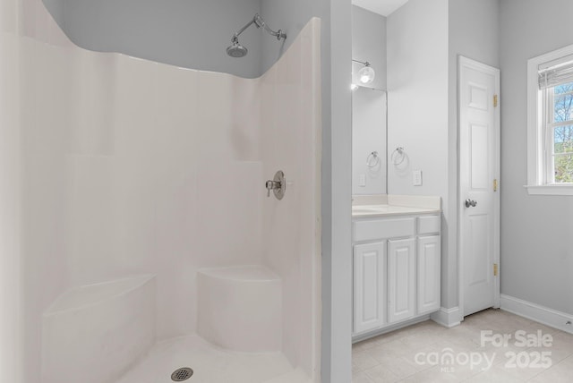 79 Mill Pond Way, Hendersonville, NC 28791 - full bath featuring baseboards, vanity, tile patterned floors, and a shower