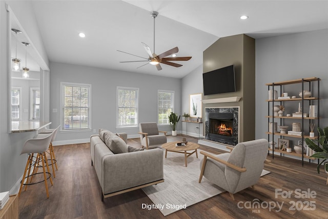 79 Mill Pond Way, Hendersonville, NC 28791 - living area featuring a fireplace, a ceiling fan, dark wood finished floors, vaulted ceiling, and recessed lighting