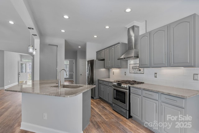 79 Mill Pond Way, Hendersonville, NC 28791 - kitchen with appliances with stainless steel finishes, wall chimney range hood, gray cabinets, light stone counters, and recessed lighting