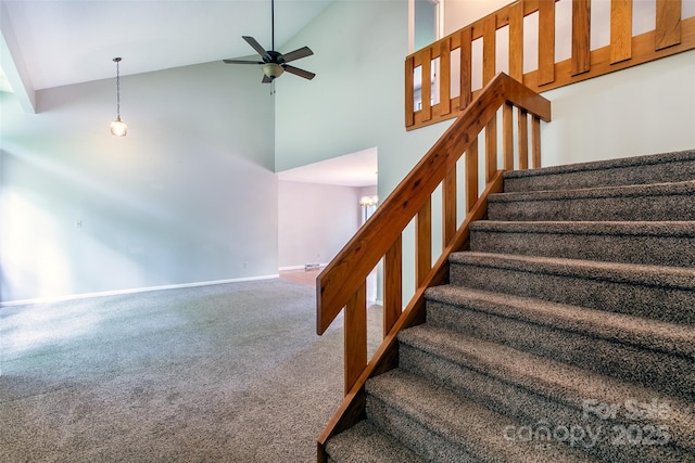 162 Southerland Rd, Pisgah Forest, NC 28768 - staircase with high vaulted ceiling, carpet, ceiling fan, and baseboards