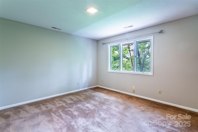 162 Southerland Rd, Pisgah Forest, NC 28768 - carpeted spare room featuring baseboards