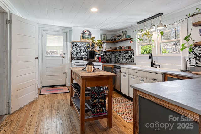 kitchen with open shelves, wood ceiling, light wood finished floors, and butcher block countertops