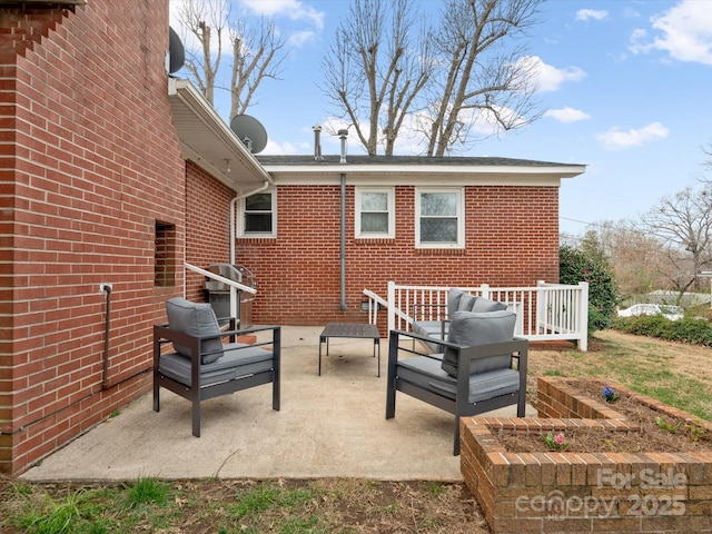 view of patio / terrace featuring outdoor lounge area and a grill