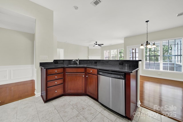 kitchen with visible vents, dishwasher, pendant lighting, a peninsula, and a sink